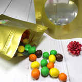 Custom Glossy Sealed Bag With Oval Clear Window And Tear Notch Metallic Foil Mylar Stand Up Household Storage Zip Lock Pouch