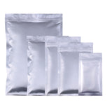 Multi-Size Tear Notch Heavy-Duty Silver Flat Aluminum Foil Self Sealing Pouch Food Snack Zip Lock Package Storage Bag